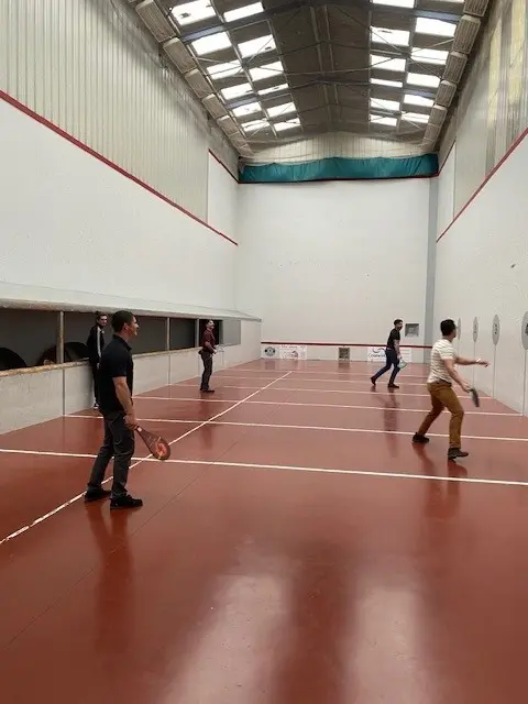 Students playing Basque pelota during a cultural immersion activity near Bordeaux